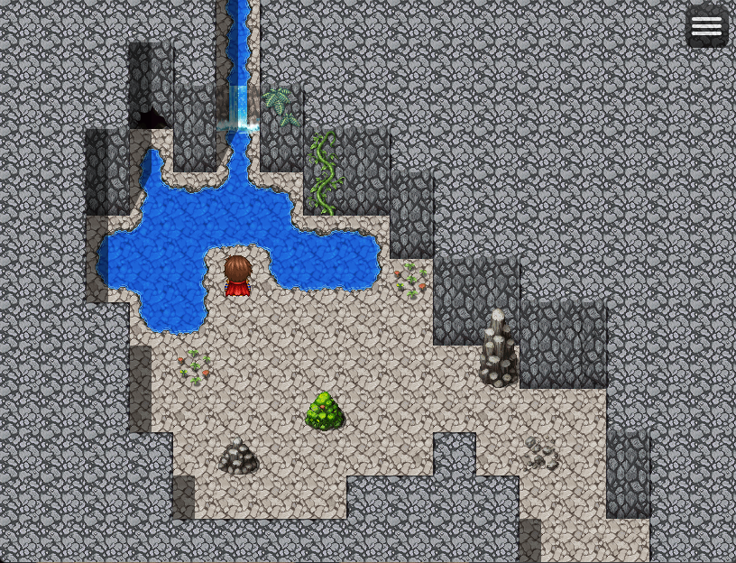A linear stone cave area with water at the end